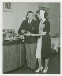 Lois Hering (Miss New York Foreign Trade Week) with man