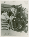 Hall of Invention - Man standing next to nude woman in cotton bale
