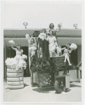 Hall of Invention - Women with cotton on top Rust Cotton Picker