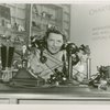 Hall of Invention - Telephone operator with antique telephones
