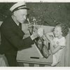 Hall of Invention - Patrick Tayleur describing model of U.S.S. Constitution to girl