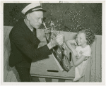 Hall of Invention - Patrick Tayleur describing model of U.S.S. Constitution to girl