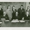 Hall of Pharmacy - Grover Whalen signing contracts with officials