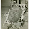 Hall of Pharmacy - Men carving giant witch head at Remo Bufano's studio