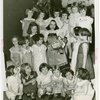 Heinz - Irene Wicker in costume with orphans
