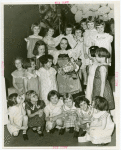 Heinz - Irene Wicker in costume with orphans