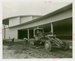 Home Building Center - Workers laying walkways