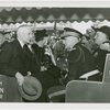 Hull, Cordell (Secretary of State) - In car with officials in uniform