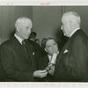 Hull, Cordell (Secretary of State) - Being presented gold medal by Thomas Watson and Fiorello LaGuardia