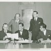Hungary Participation - Grover Whalen signing contract with Lázsló Négyesy and others