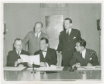 Hungary Participation - Grover Whalen signing contract with Lázsló Négyesy and others