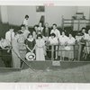 Illinois Participation - Group of men and women look at model of Chicago