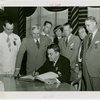 Illinois Participation - John Cassidy signing guestbook with Howard Gorman, A.F. Lorenzen, Sol Roderick, Hugh Cross and others