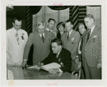 Illinois Participation - John Cassidy signing guestbook with Howard Gorman, A.F. Lorenzen, Sol Roderick, Hugh Cross and others