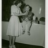 Illinois Participation - Woman giving Eugene Doyle milk