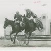 Indian (Native American) Participation - Two Haskell Institute guards on horseback jumping