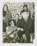 Indian (Native American) Participation - Hopi man passing pipe to Fred Blair Townsend