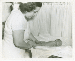 Infant Incubator - Nurse drying baby