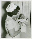 Infant Incubator - Nurse with crying baby