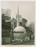 Information Booths - Workers building booth shaped like Trylon and Perisphere in Times Square