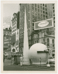 Information Booths - Workers building booth shaped like Trylon and Perisphere in Times Square