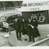 Information Booths - Attendant helping men and woman at booth at the New Jersey end of the George Washington Bridge