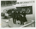 Information Booths - Attendant helping men and woman at booth at the New Jersey end of the George Washington Bridge