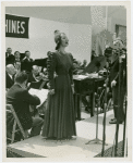 International Business Machines (IBM) - Lily Pons singing at concert