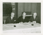 International Business Machines (IBM) - Watson, Thomas J. (President) - With Harvey Gibson signing contract while Walter Gifford looks on