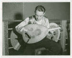 Iraq Participation - Man playing instrument