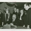 Ireland Participation - Grover Whalen and man signing book