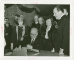Ireland Participation - Grover Whalen and man signing book