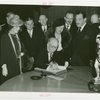 Ireland Participation - Grover Whalen and man signing book