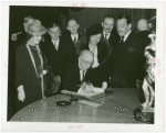 Ireland Participation - Grover Whalen and man signing book