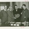 Italy Participation - Grover Whalen with Italian officials and plaque for Mussolini