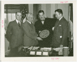 Italy Participation - Grover Whalen with Italian officials and plaque for Mussolini