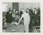Jewish-Palestine Participation - Woman signs book