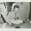 Kansas Governor Payne Ratner signs book