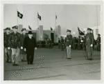LaGuardia, Fiorello, H. - Reviewing twilight parade of U.S. Army troops