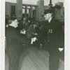 LaGuardia, Fiorello, H. - Decoration Ceremonies - Shaking hands with officer
