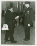 LaGuardia, Fiorello, H. - Decoration Ceremonies - Standing with officer