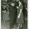 LaGuardia, Fiorello, H. - Decoration Ceremonies - Pinning posthumous medal on officer's wife