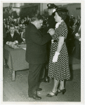LaGuardia, Fiorello, H. - Decoration Ceremonies - Pinning posthumous medal on officer's wife