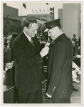 LaGuardia, Fiorello, H. - Decoration Ceremonies - With man pinning medal on officer