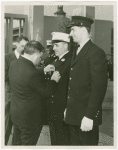 LaGuardia, Fiorello, H. - Decoration Ceremonies - Pinning medal on officer