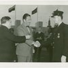 LaGuardia, Fiorello, H. - Whalen, Grover - Shaking hands with officer