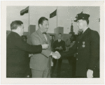 LaGuardia, Fiorello, H. - Whalen, Grover - Shaking hands with officer