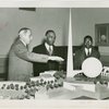 Liberia Participation - Walter F. Walker and son looking at model
