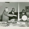 Liberia Participation - Walter F. Walker and son looking at model