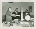 Liberia Participation - Walter F. Walker and son looking at model